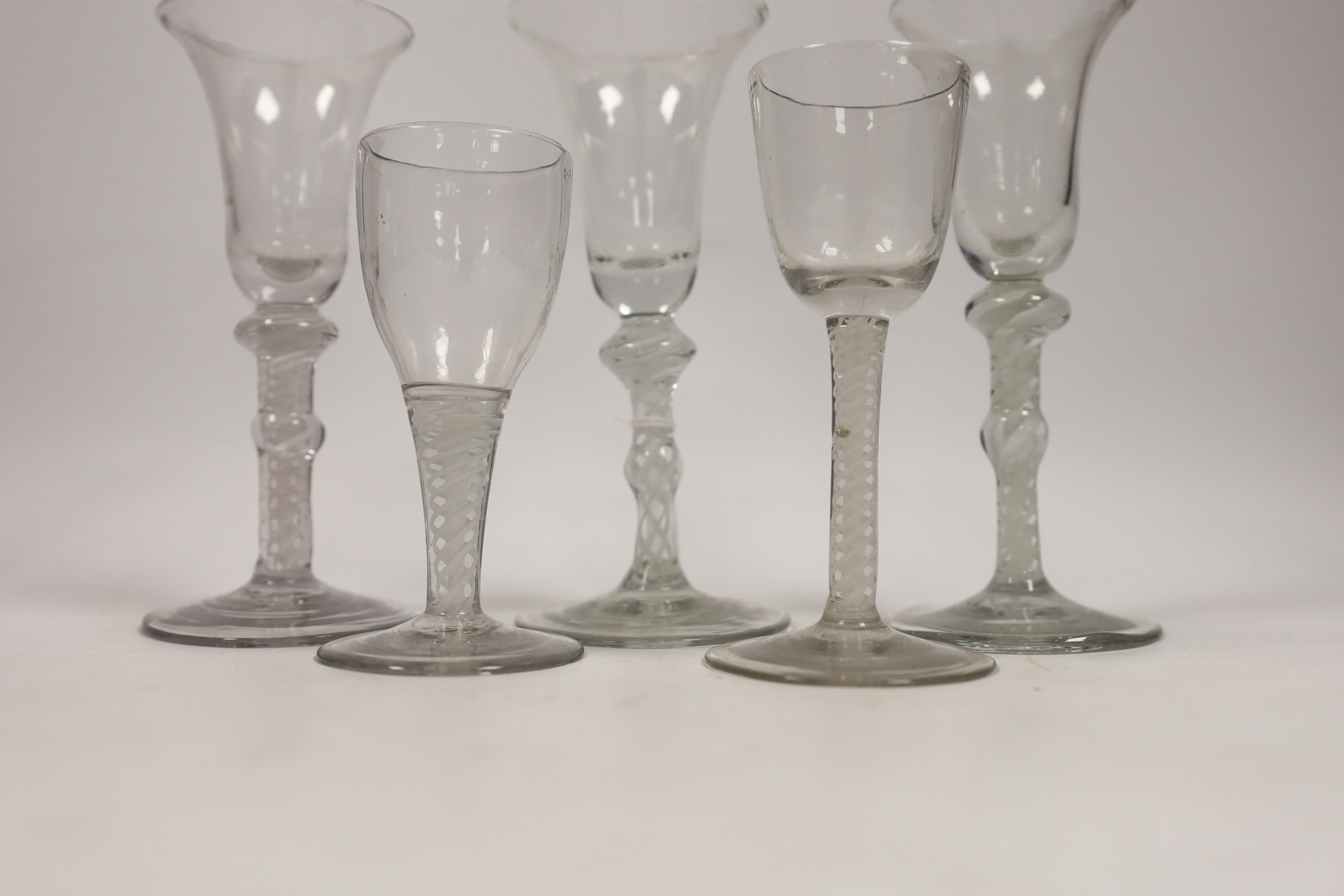 Five 19th century Dutch DSOT stem soda wine glasses, largest 17cm high